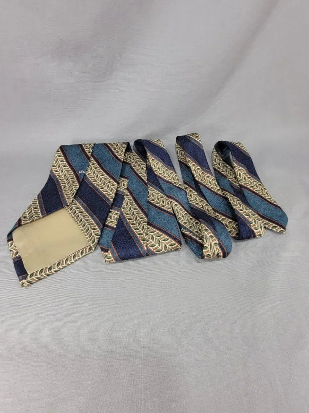 Calvin Klein Silk Necktie Tie Mens Blue Tan Stripe Leaf Geometric USA